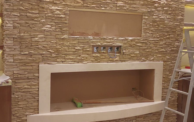 Stone wall & fireplace